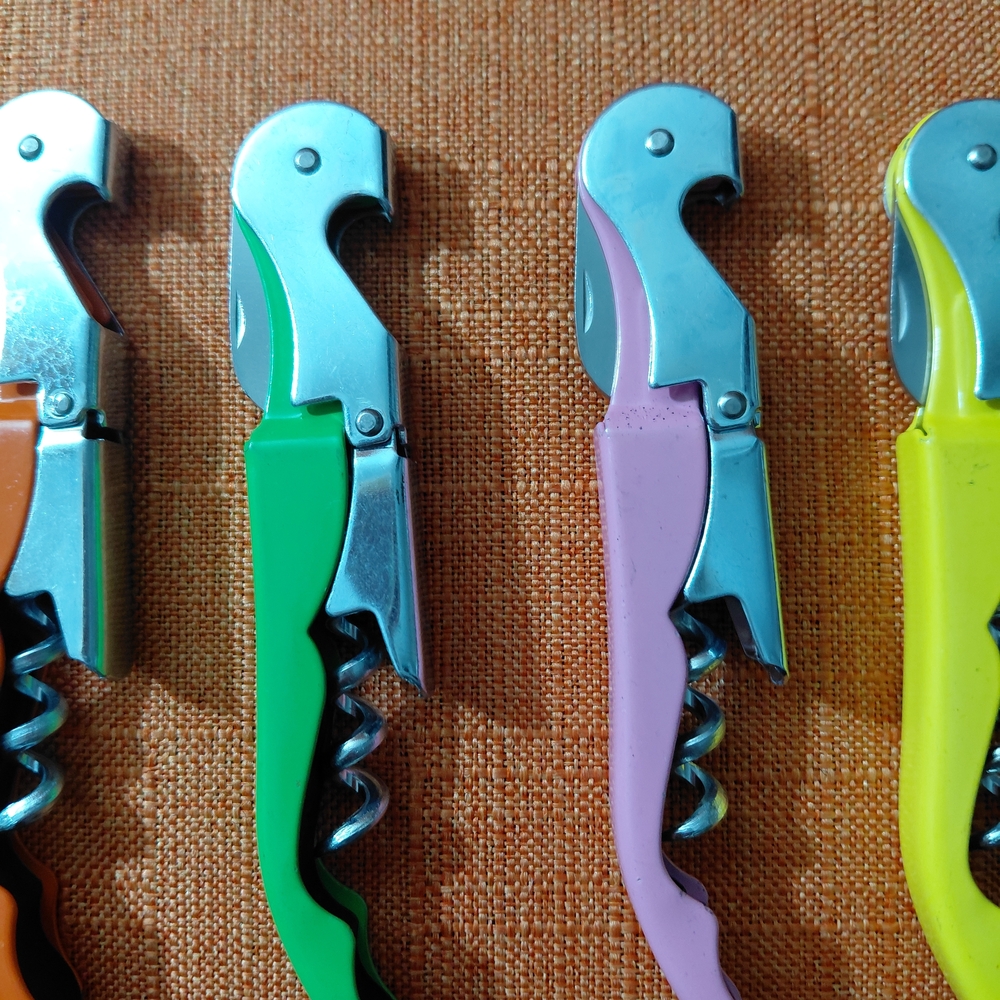 New: $ 25 for the set of 4: Multicolor Corkscrew Bottle Opener Set. $10.00 each.